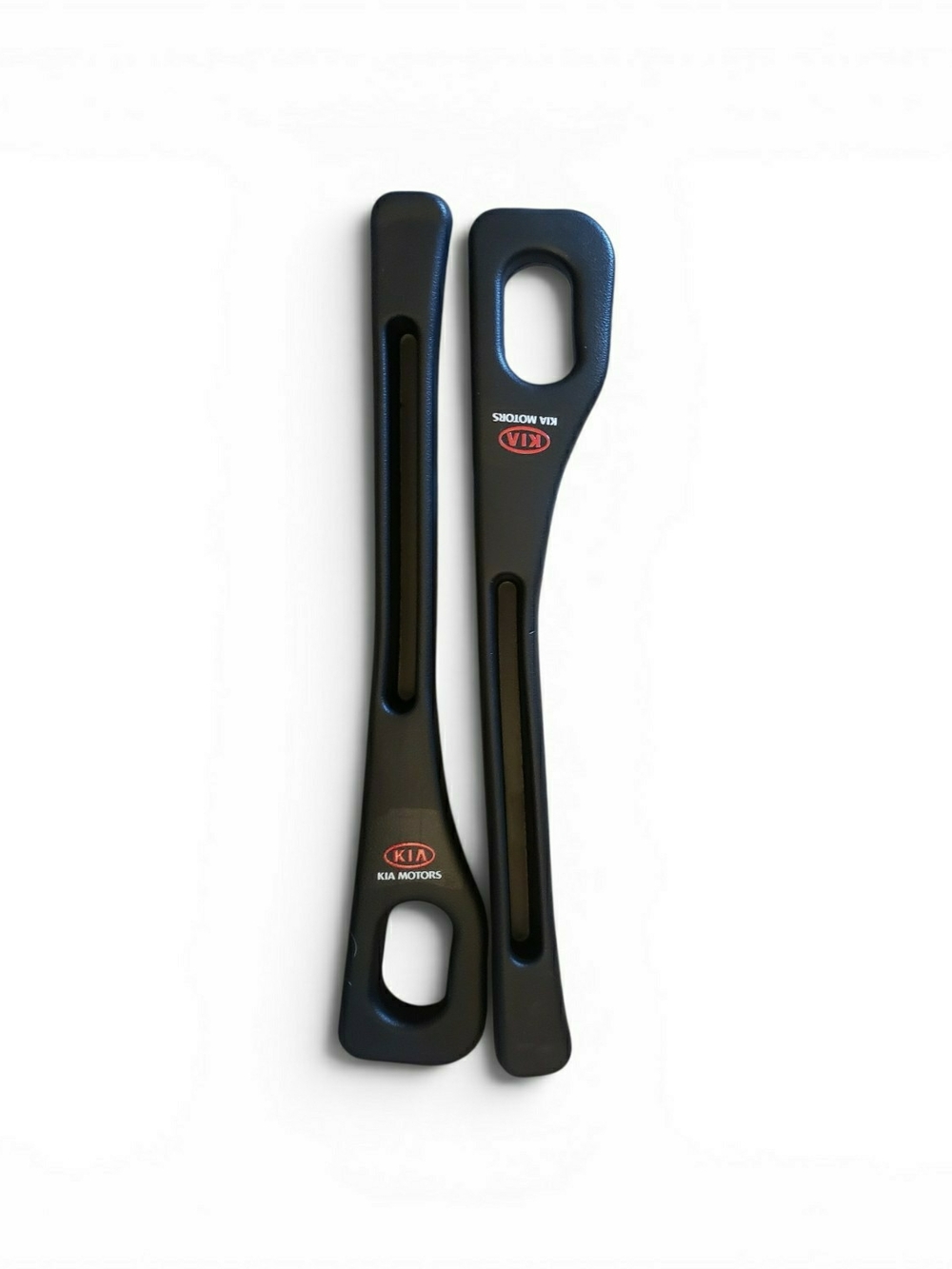 Kia branded in black plastic inserts are designed as car seat gap fillers. New